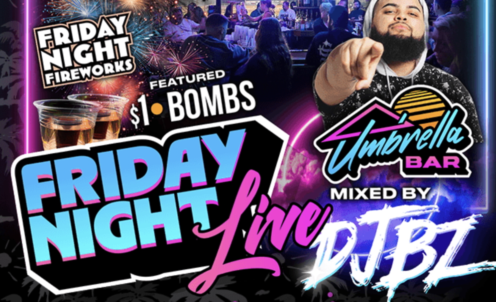 DJ Brotha Z performing during Friday Night Live at Umbrella Bar with fireworks over Ballpark Commons
